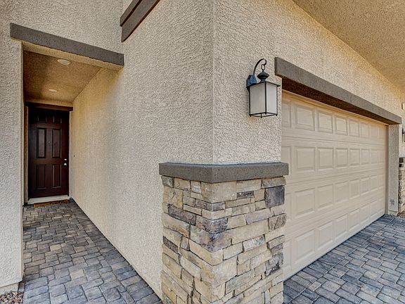 Entry walkway to 7051 Baza Ave