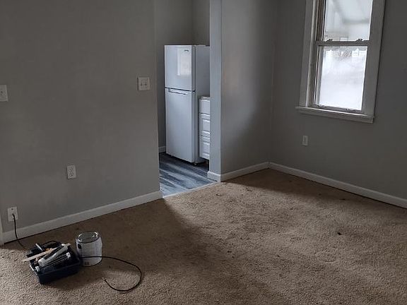 Living Area into kitchen freshly painted