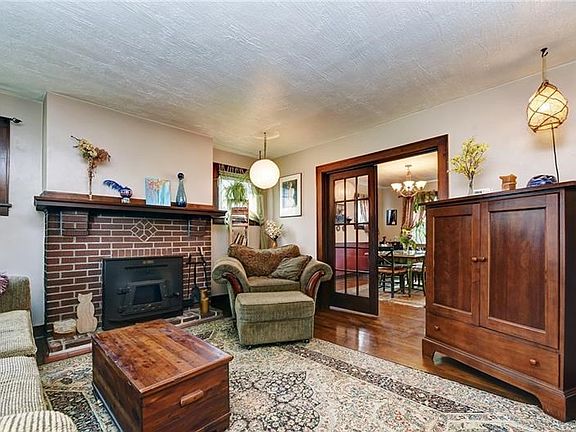 Living room, fireplace at center