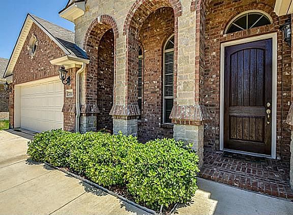 Note the Custom Stone & Brick Work