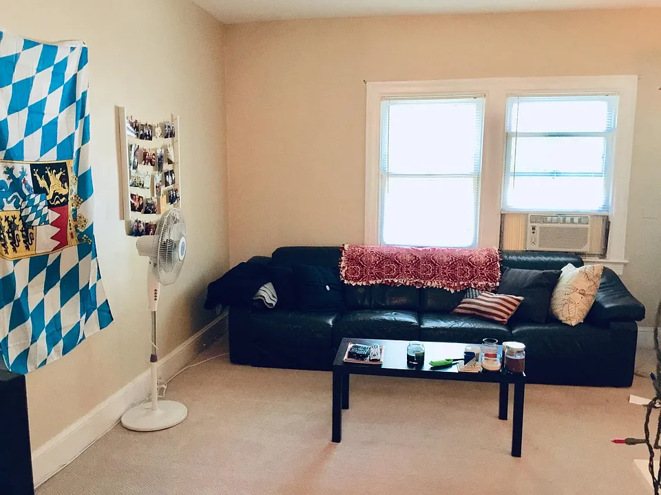 Living room (now) has hardwood floors.