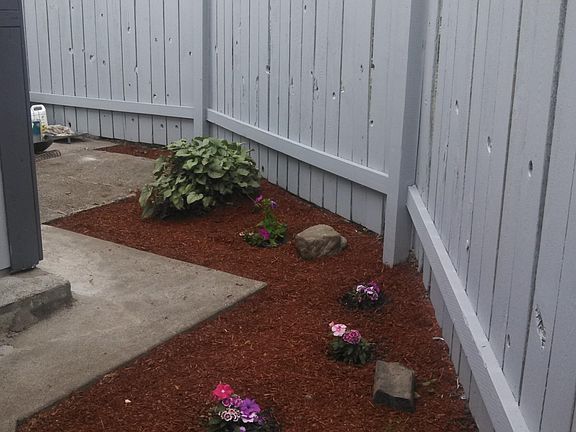 Outside Planting Area, Partial View of Patio.