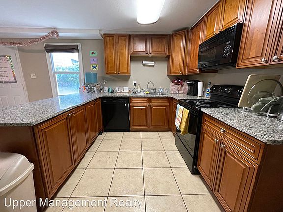 4th image of 5830 S Robertson St #9713251