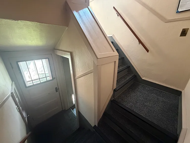 Rear shared stairwell & exterior door