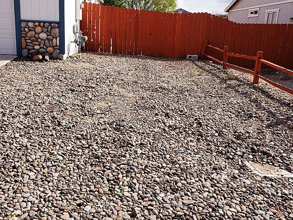 Side Yard w/ RV Access at Front of House