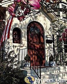 Curved front door with accent window