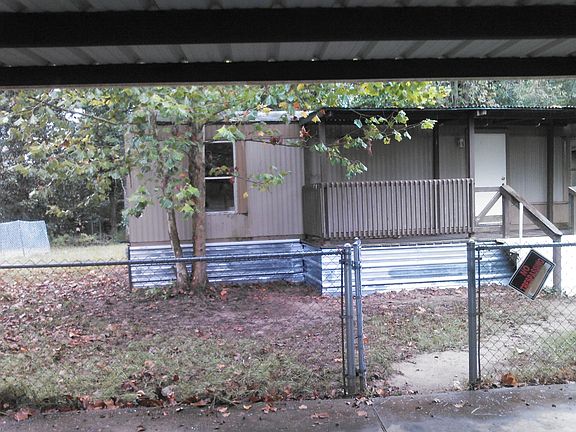 Front View With Carport