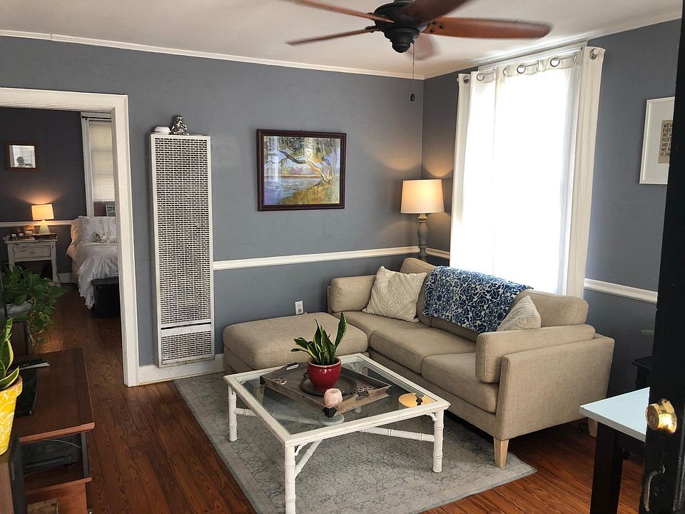 Living Area into Bedroom on left