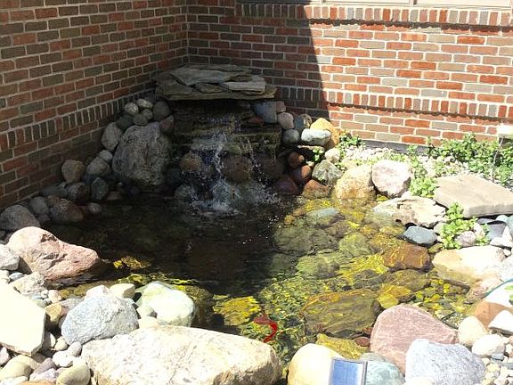 Stunning and peaceful - listen to the gentle sound of water flowing as you approach the home - tucked nicely in the corner just next to the front porch.