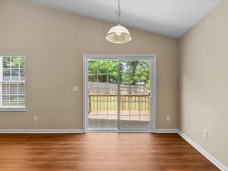 Dining area with sliding glass doors to deck