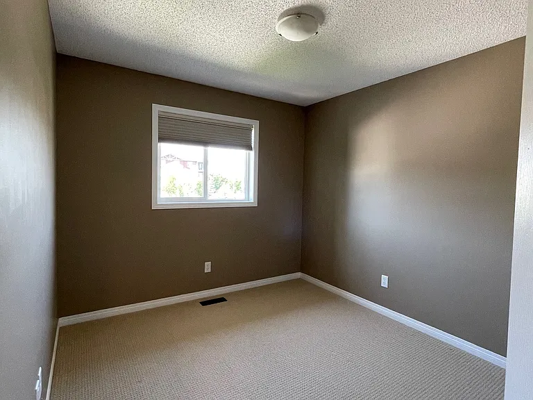 7685 Schmid Cres NW — Photo 31