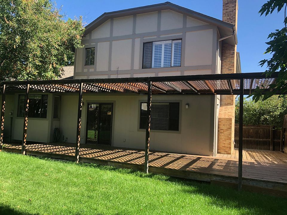 Great house with room to play and entertain! Pictured is the large back deck.