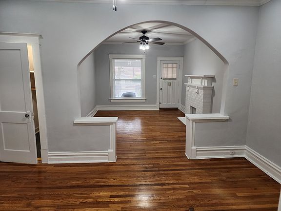 View from the middle room looking into the front room thru archway