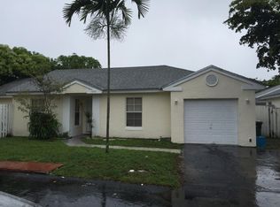 5791 Woodland Point Dr, Tamarac, FL 33319