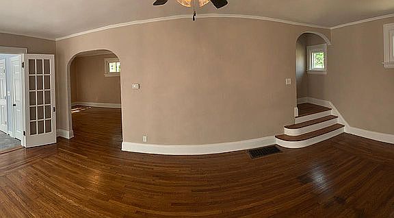 Living room. Newly refinished hardwood floors throughout house (2022)
