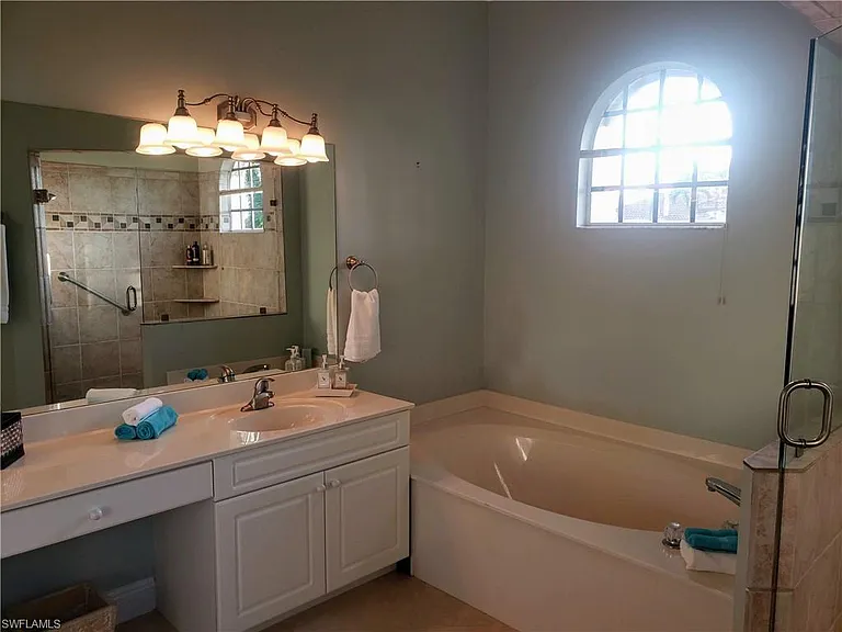 8906 Lely Island Cir — Photo 32