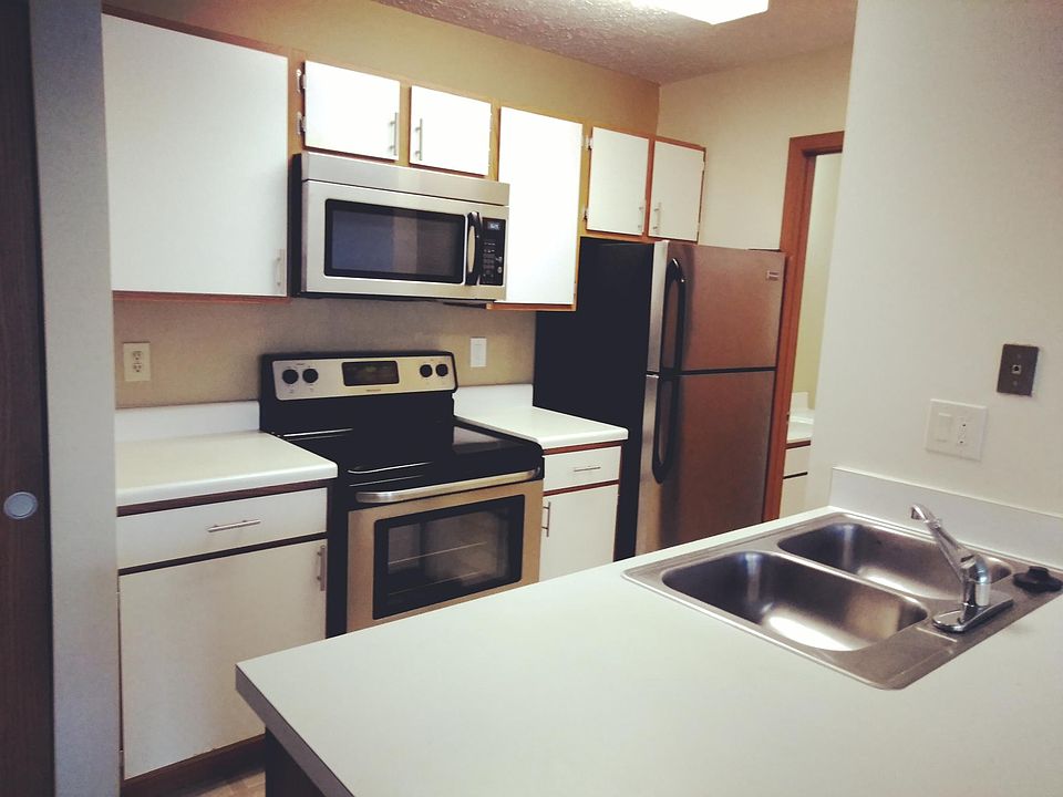 Kitchen with stainless steel appliances.