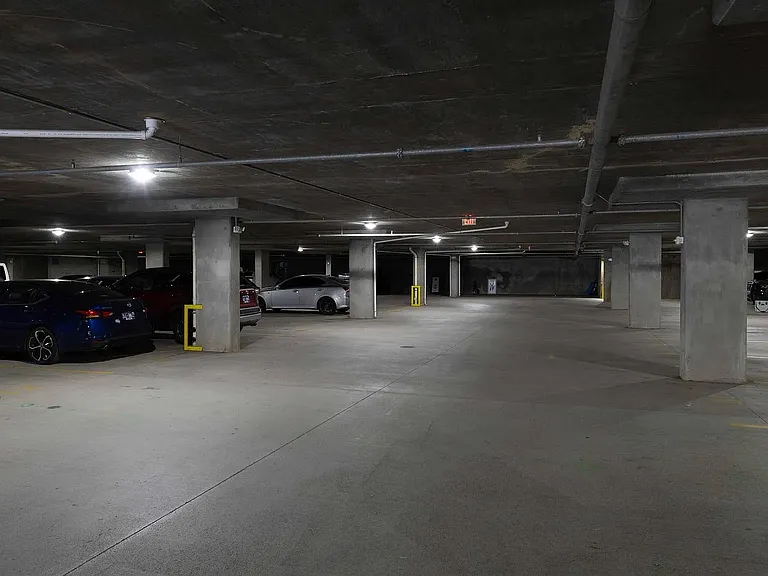 2 parking spaces in a gated garage