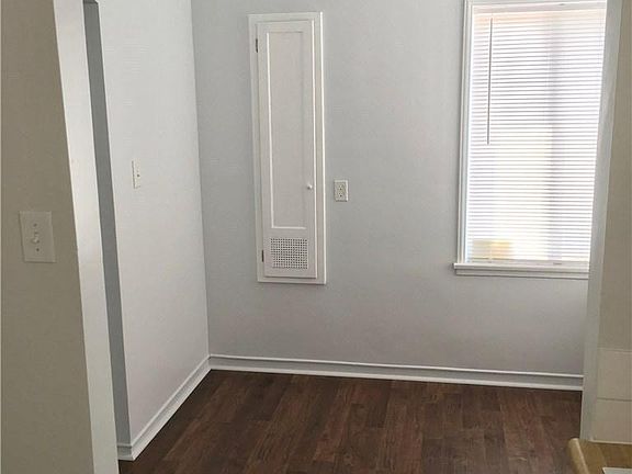 Dining nook with built-in shelves.