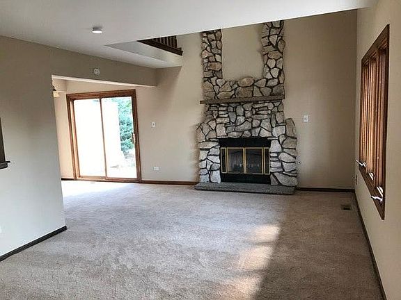Living Room South - gas fireplace with circulation fan