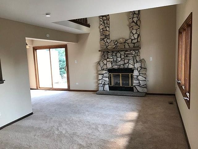 Living Room South - gas fireplace with circulation fan