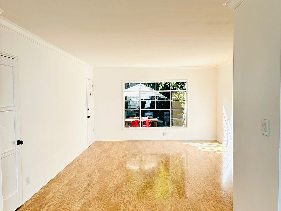 Standing in dining area looking at living room.
