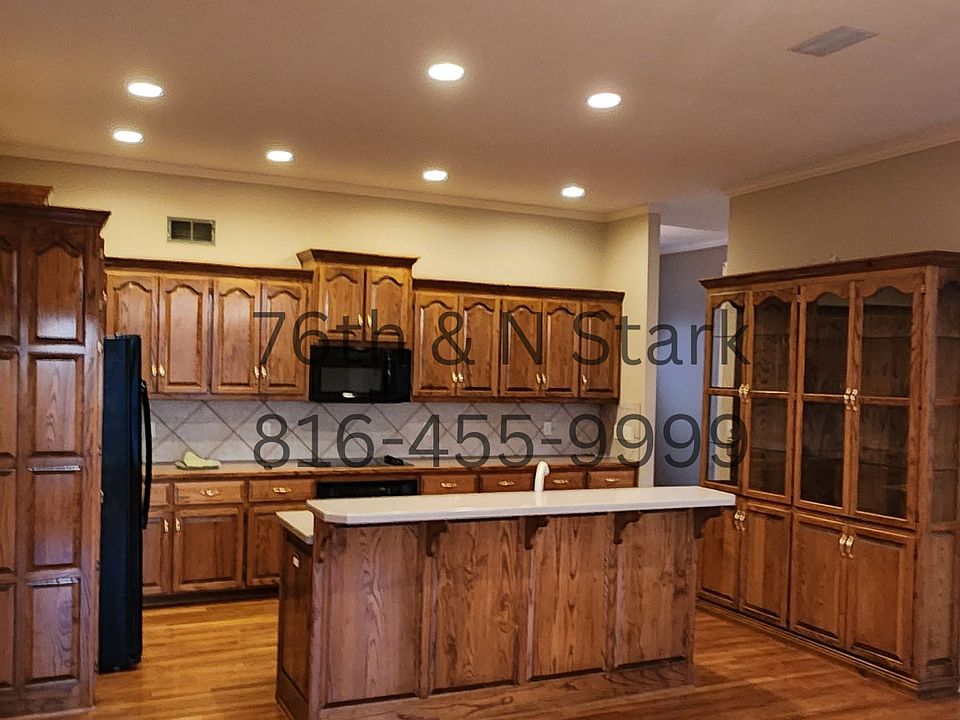 Kitchen, with an expansive layout perfect for culinary creations and family gatherings.