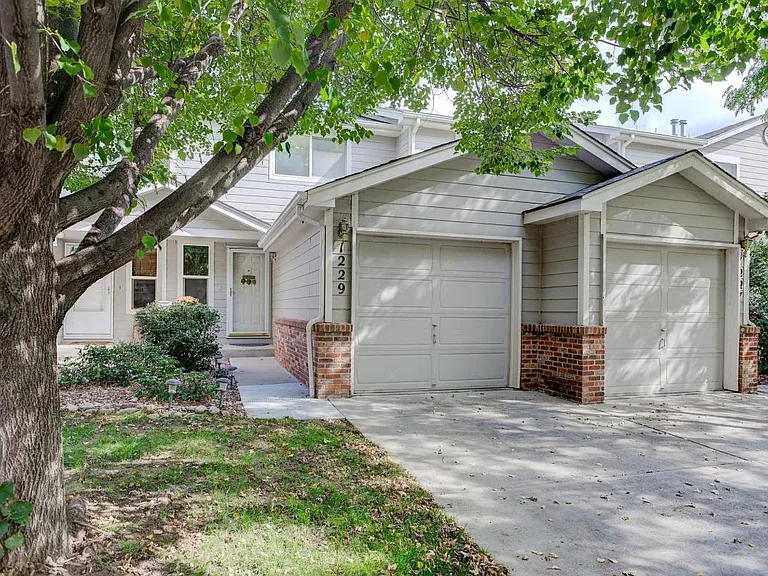 Entrance: Garage Space + Driveway