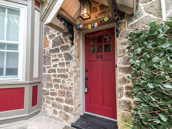 Front door to home along right side rear of house