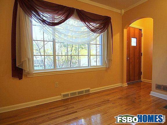 Main Entry with Large Window Overlooking Front Yard