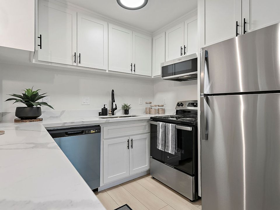 Experience effortless cleanup with a deep kitchen sink and a sleek pull_down sprayer faucet designed for maximum convenience.