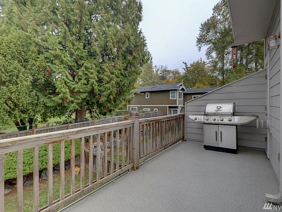 Large Deck off living room looking down to your yard.