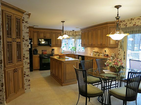 newer kitchen w/dining area & walk out to deck