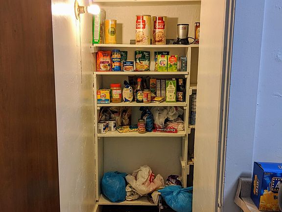 Large food pantry in kitchen
