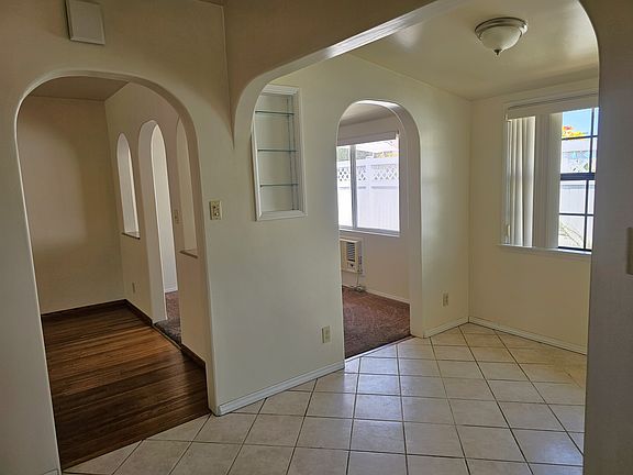 View from the kitchen into the living room and the bonus room
