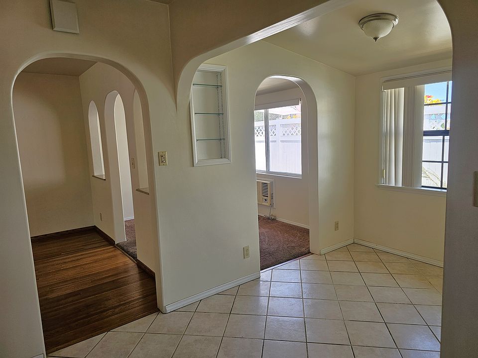 View from the kitchen into the living room and the bonus room