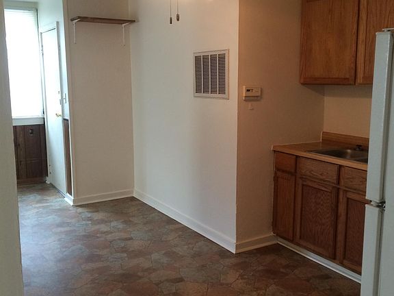Kitchen looking into the extra room off the kitchen.