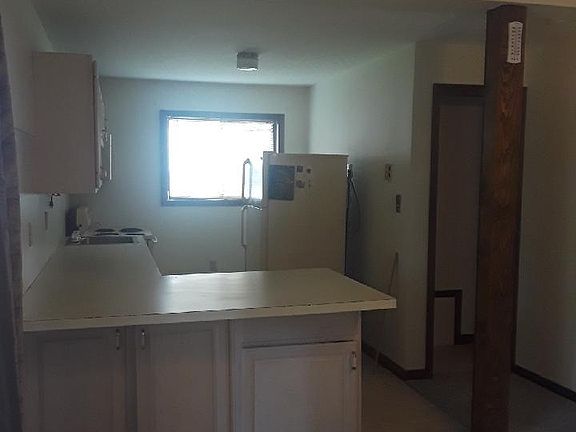 Spacious kitchen with breakfast bar.