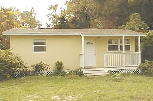 This is an adorable, affordable dollhouse! New siding, new roof, new porch.