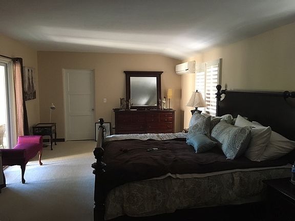 spacious master's bedroom with newly renovated bathroom, a n