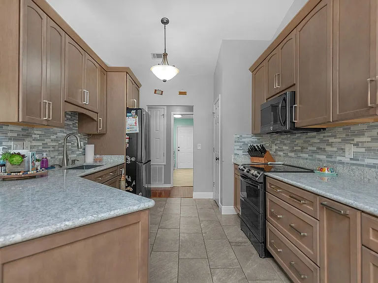 7017 Brighton Oaks Blvd — Photo 6