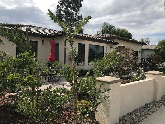 All new and professionally landscaped front