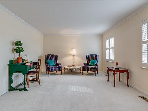 Spacious living room with attractive plantation shutters