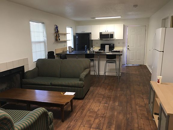 Large living room. Two refrigerators. 