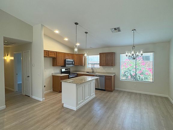 Living room looking towards kitchen/dining area