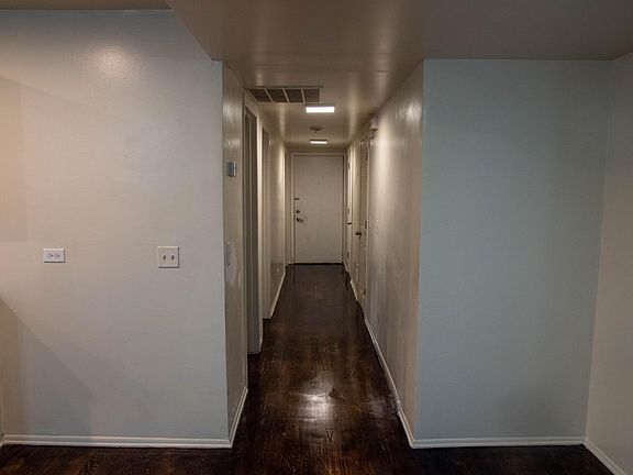 Hallway leading to bathroom and bedrooms