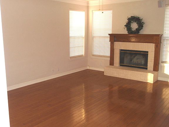 Living room wired for surround sound.