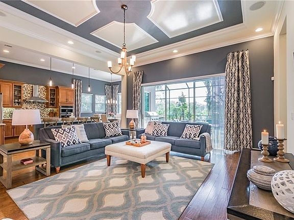 WOW!! The copious amount of detail in the finishes are breathtaking in the family room! :-)