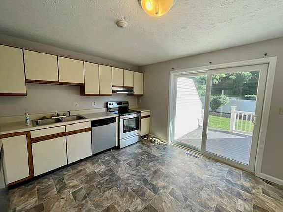 Kitchen with slider to back deck