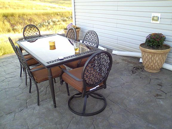 Concrete back patio 16x60 with fully fenced back yard